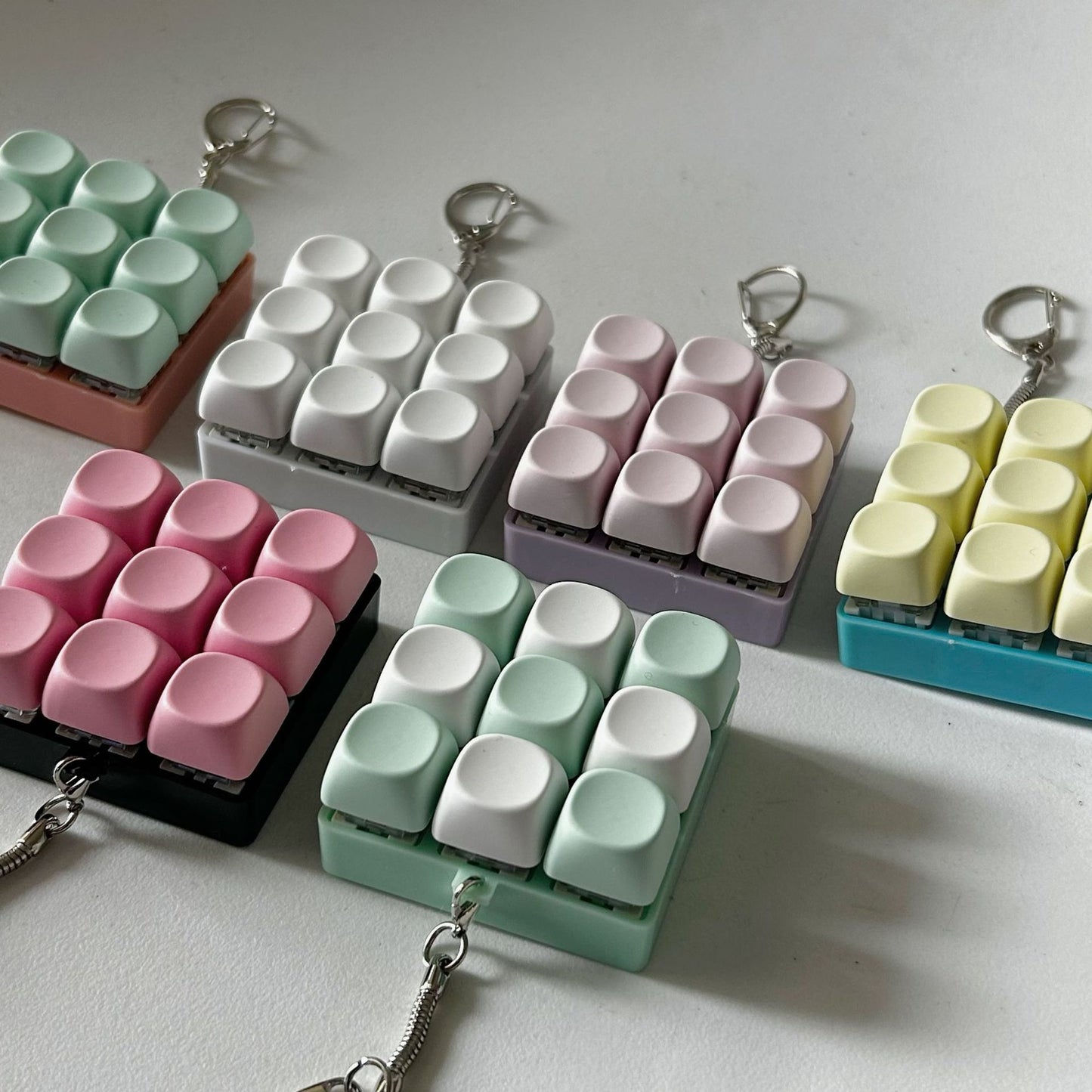 2-Pack Light Blue Mechanical 9-Keyboard Fingertip Toy Keychain - Key Pressure Relief, PVC Fingertip Toy